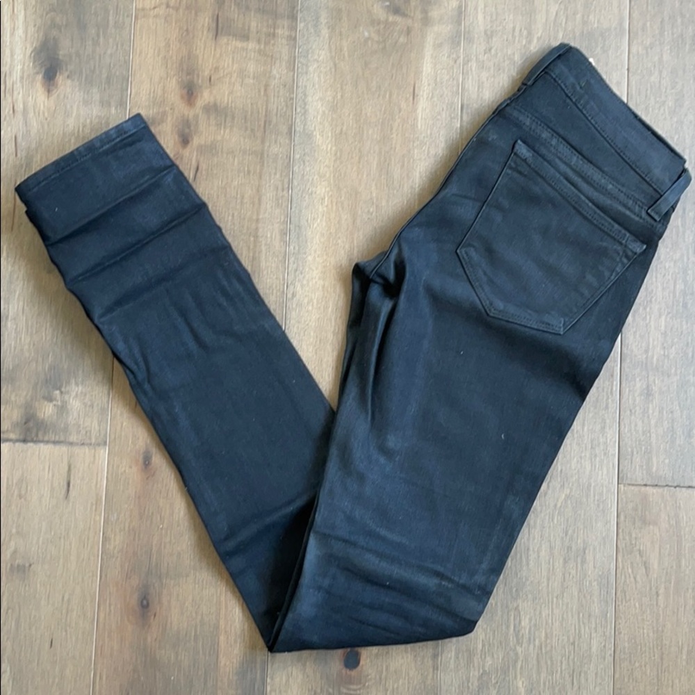 Wax covered J Brand pencil leg jeans